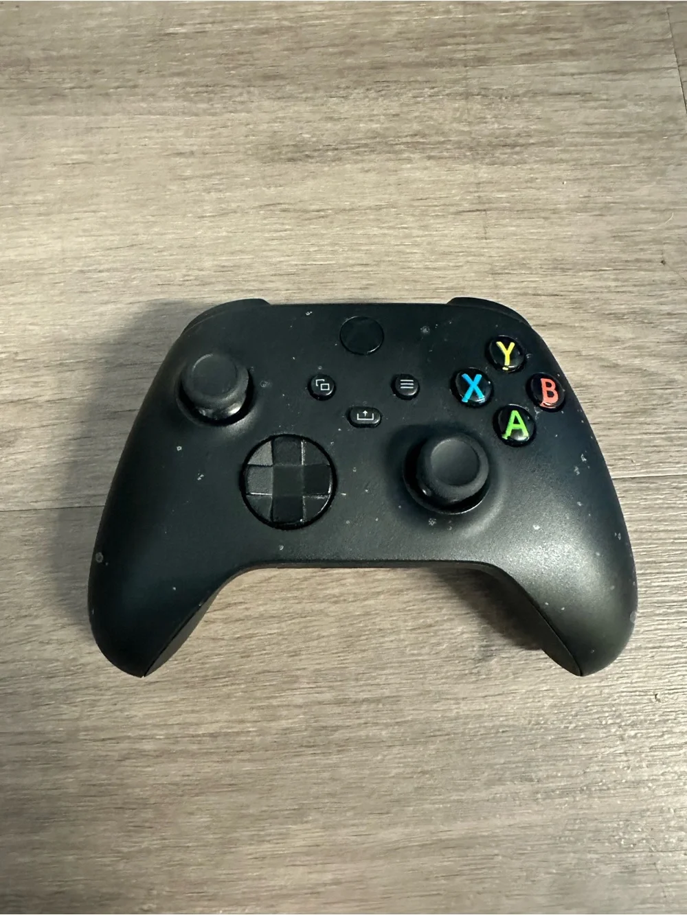 Sleek Black Wireless Gaming Controller with Color Buttons